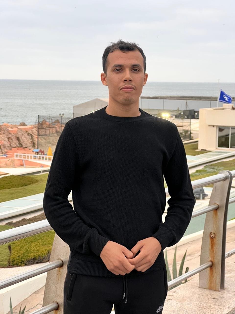 Portrait of Abdelkabir El Bahmadi by the sea